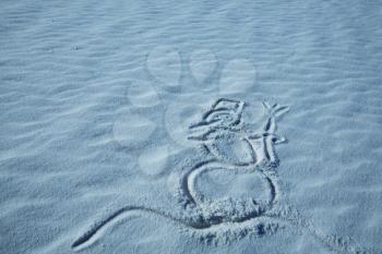 Royalty Free Photo of a Snowman Drawn in the Snow