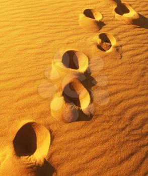 Royalty Free Photo of Footprints in Sand