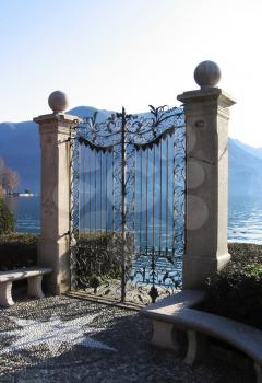 Royalty Free Photo of a Gate on a Lake Coast