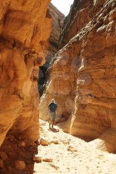 Royalty Free Photo of a Man in a Canyon in Egypt