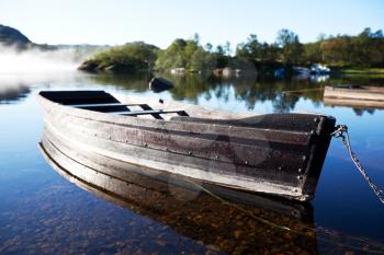 Royalty Free Photo of a Boat on a Lake