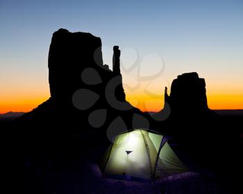 Royalty Free Photo of a Tent in Monument Valley at Night