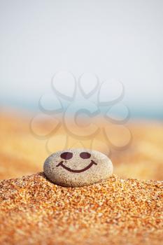 Royalty Free Photo of a Happy Face Pebble