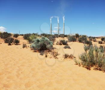 Royalty Free Photo of a Power Plant in the Desert