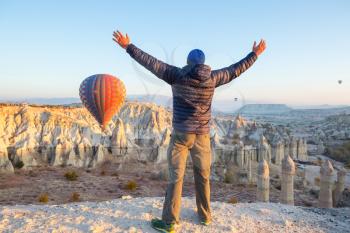 Tourist in famous touristic place Cappadocia, Turkey