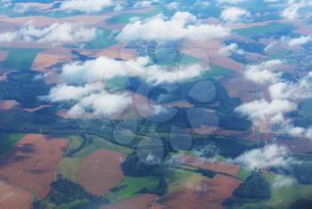 Aerial view from aircraft flying in high altitude. Landscape from above.