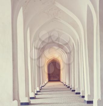 White Arabian arches in Kolon mosque. Bukhara. Uzbekistan. East Asia.