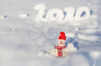 Pretty Snowman on snowy New Year 2020  date background