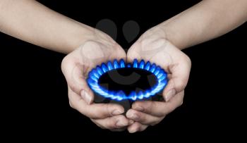 Royalty Free Photo of a Person Holding a Gas Burner