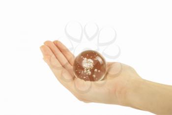 Hand holding a Crystal Ball for background