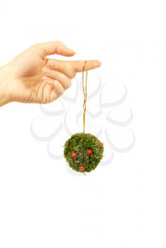 Hand and christmas decoration isolated on white background