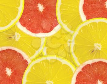 Abstract background of citrus slices. Closeup. Studio photography
