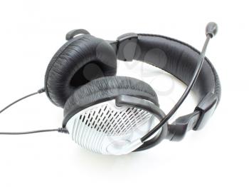 The big silvery headphones with the black holder on a white background