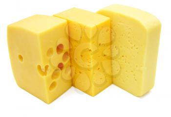 three pieces of different kinds of cheese isolated on a white background