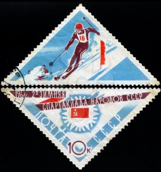 USSR - CIRCA 1966: A post stamp printed in USSR shows slalom, devoted to the Winter Games of people of the USSR, series, circa 1966