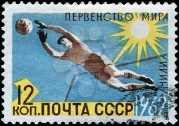 USSR - CIRCA 1962: A stamp printed in the USSR shows image of a football (soccer) player, series, circa 1962