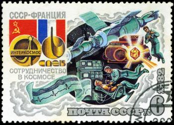 USSR - CIRCA 1982: A Stamp printed in USSR shows cooperation USSR and France into space, with inscriptions and name of series USSR - France Space Cooperation, circa 1982