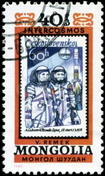 MONGOLIA - CIRCA 1980: A stamp printed in Mongolia showing stamp with cosmonauts A. Gubarev and V. Remek circa 1980