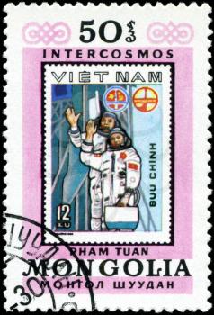 MONGOLIA - CIRCA 1981: A stamp printed by Mongolia, shows Vietnam Cosmonauts, circa 1981