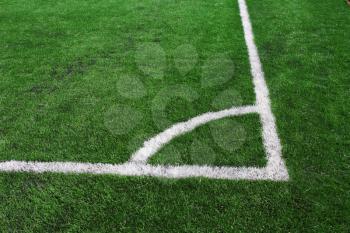 Soccer green field artificial grass with white lines 