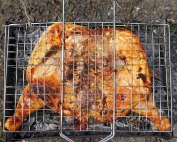 Roast chicken on grill