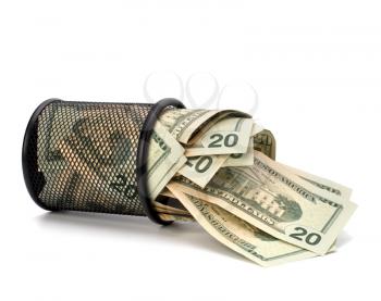 Waste of money concept. Dollars in garbage bin isolated on white background.