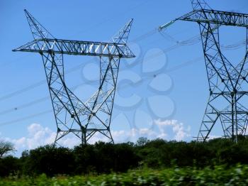 Royalty Free Photo of High Voltage Cable Towers in Countryside