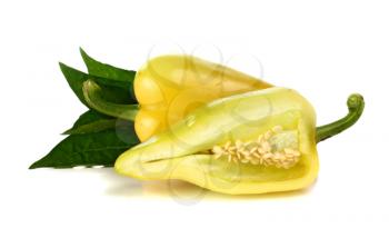 yellow pepper and green leaf isolated on white background
