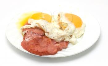 fried sausage with eggs on a white background