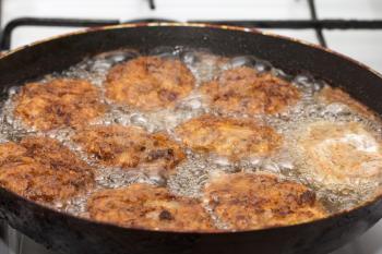 cutlets fried in a pan