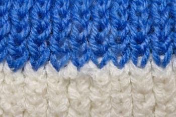 white and blue knitted fabric as background