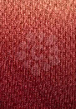 background of red knitted fabric