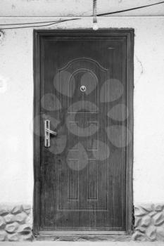 old black and white door