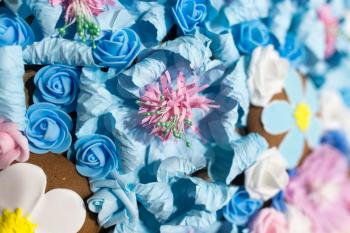 Beautiful artificial blue flowers as a background. texture