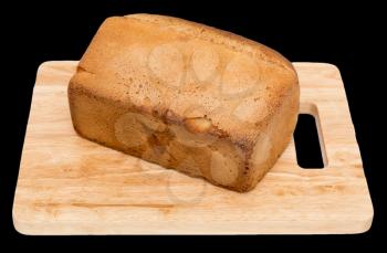 bread on a board on a black background