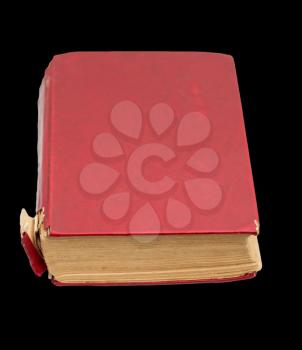 old red book on a black background