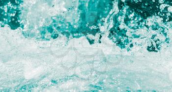 background of stormy water with splashes