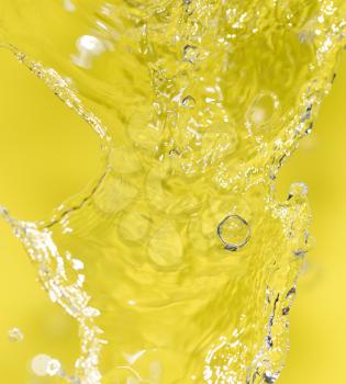 water on a yellow background