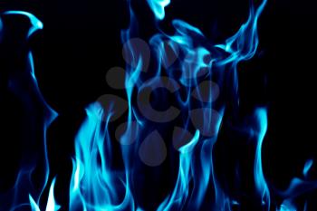 Blue flames on a black background