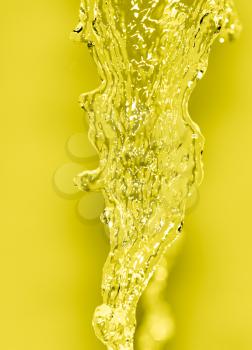 splashes of water on a yellow background