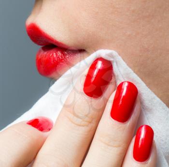 red manicure and red lips