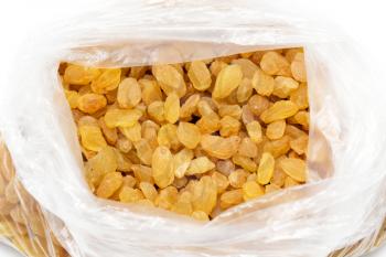 yellow raisins in a plastic bag