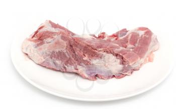 fresh meat in a dish on a white background