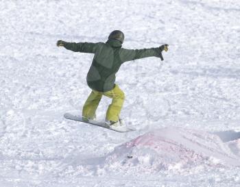 people snowboarding on the snow