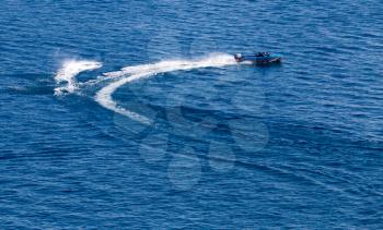 motor boat on the water at a speed of