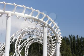 Design roller coaster against the sky