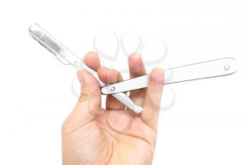 razor in his hand on a white background