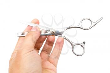 Thinning scissors in hand on white background