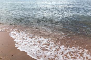 sandy shore of the sea as a backdrop