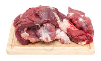 meat on a board on a white background